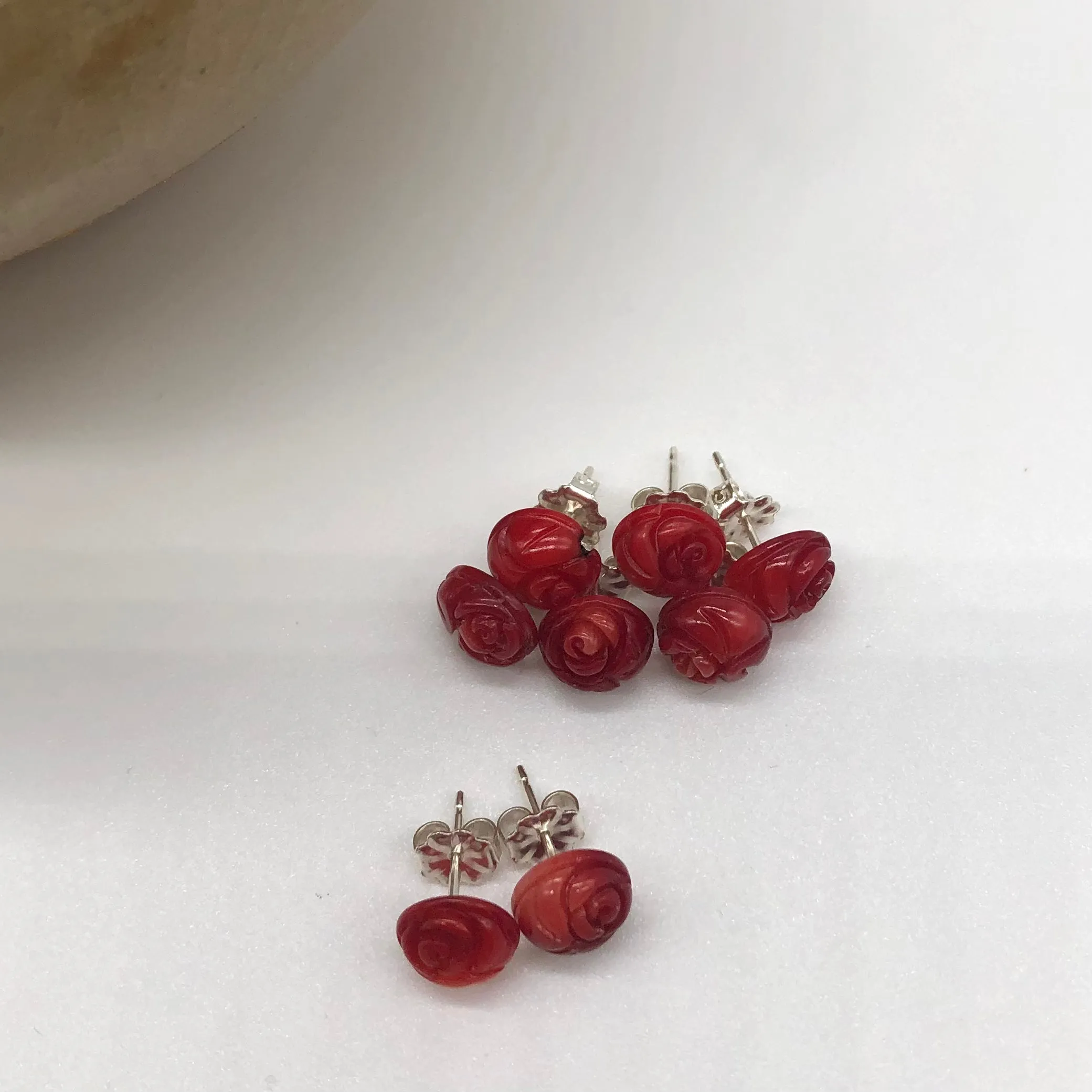 Carved Bamboo Coral Rose Earrings